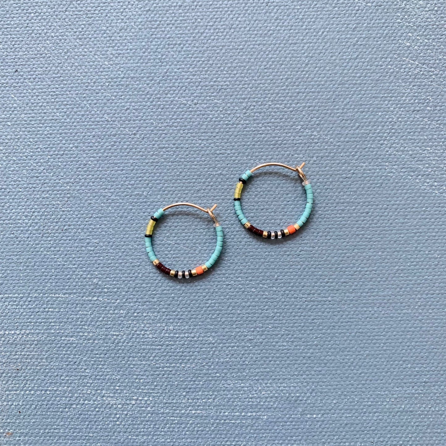 small beaded hoop in turquoise blue