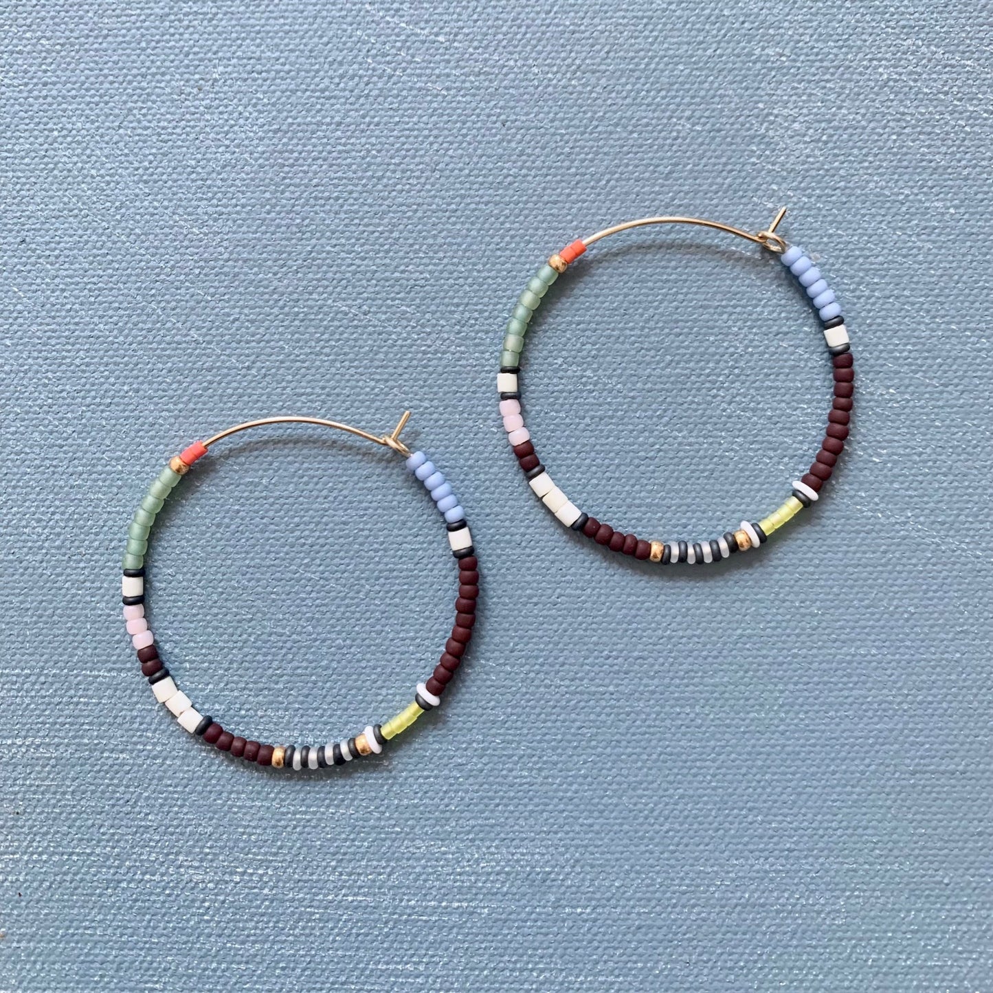 big beaded hoops in multicolor brown