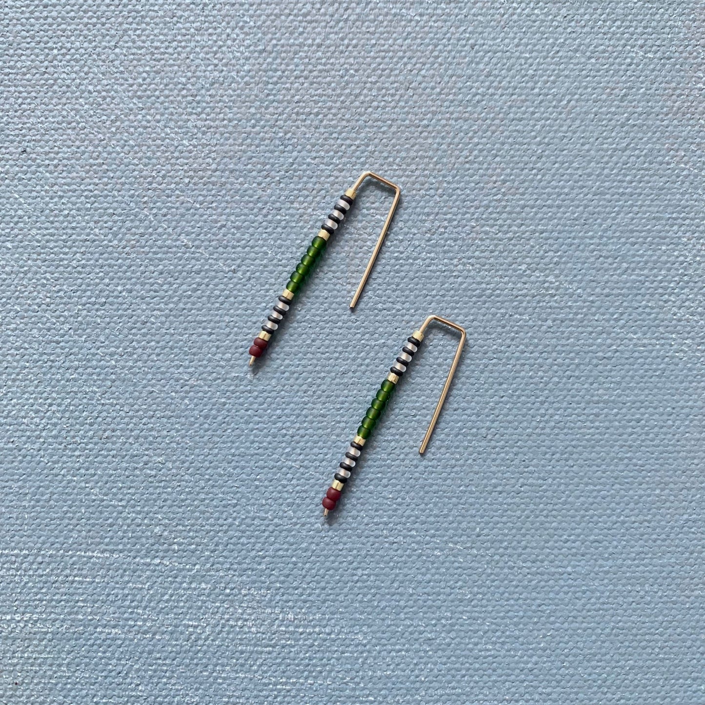 large beaded staple earring in olive