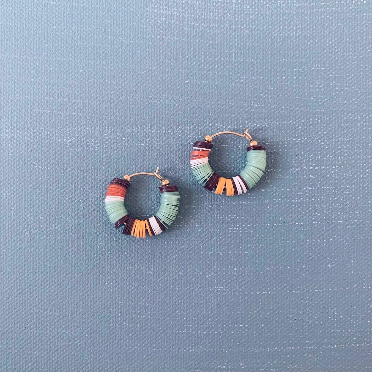 small striped beaded hoops in poolside