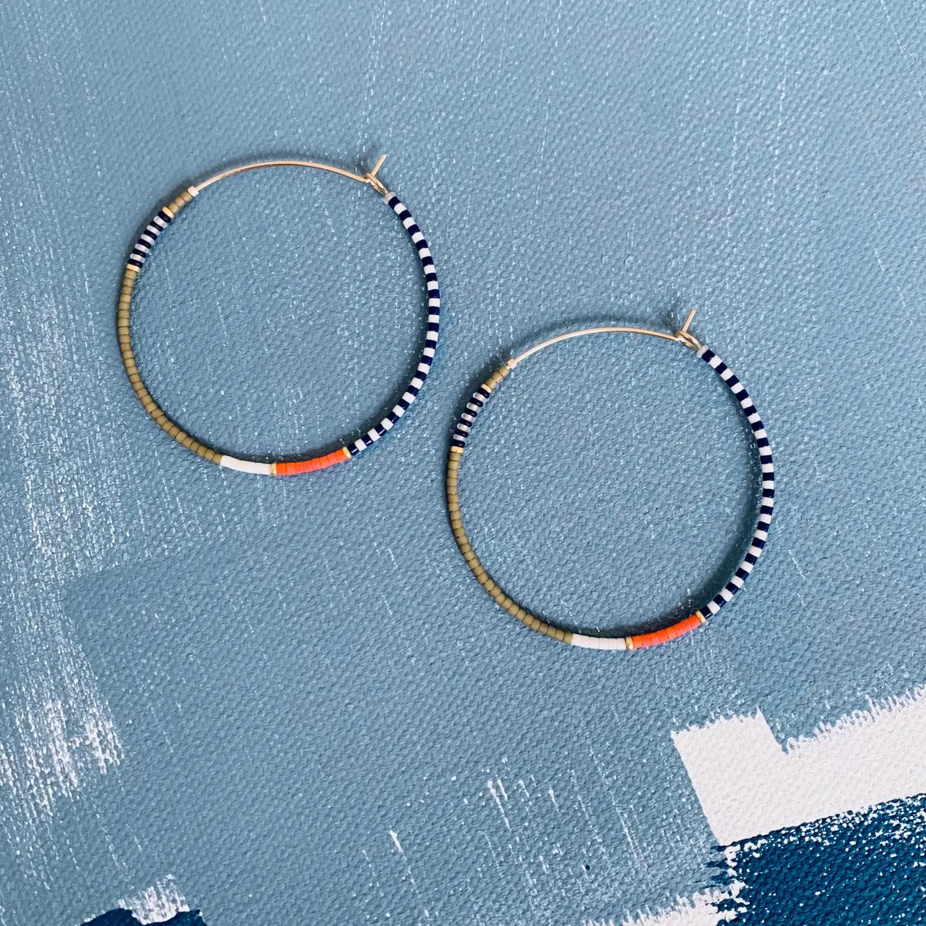 thinnest line large beaded hoops in stripe