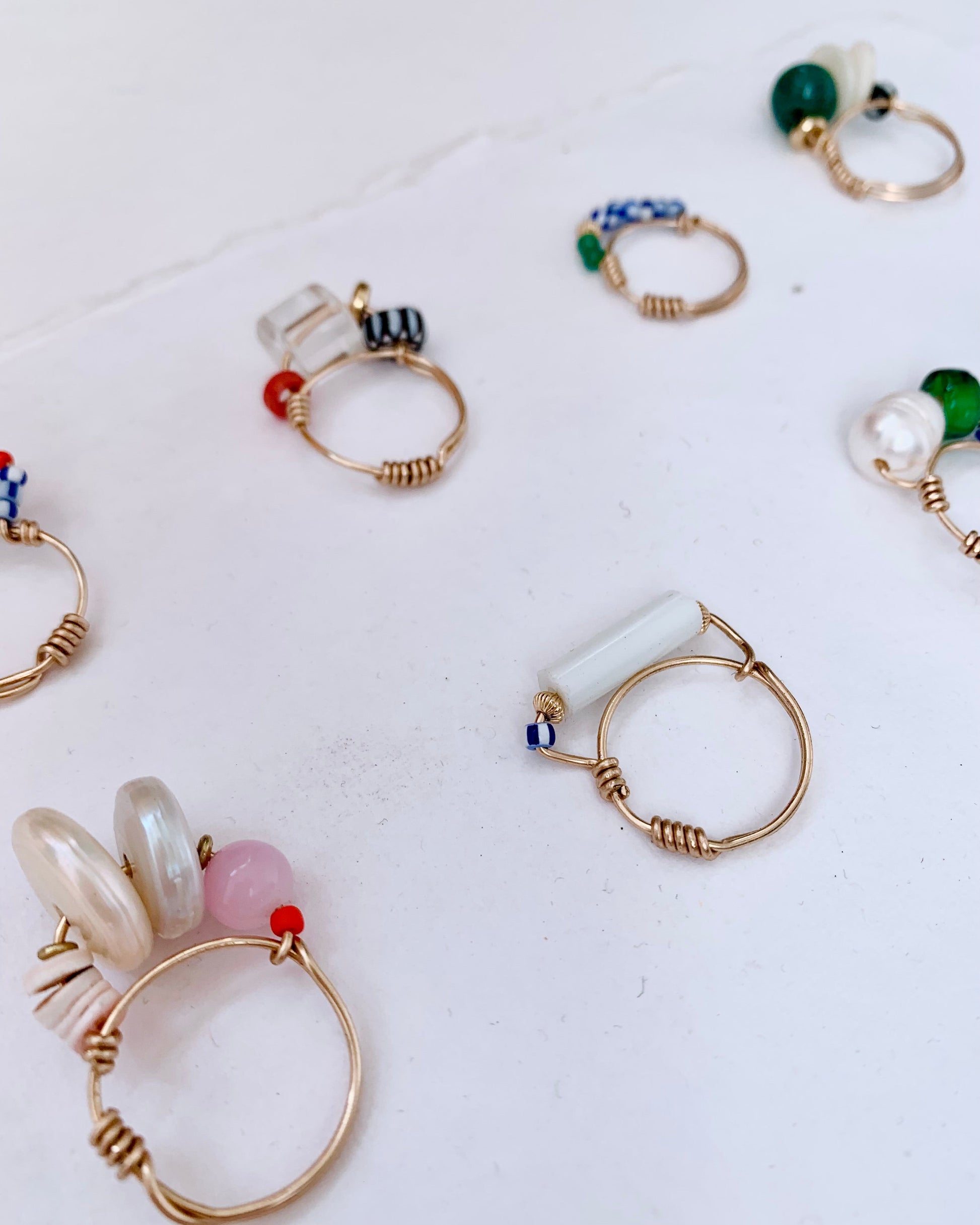 assortment of chunky art jewelry rings